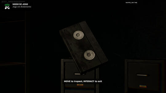 VHS tape being inspected in a videogame